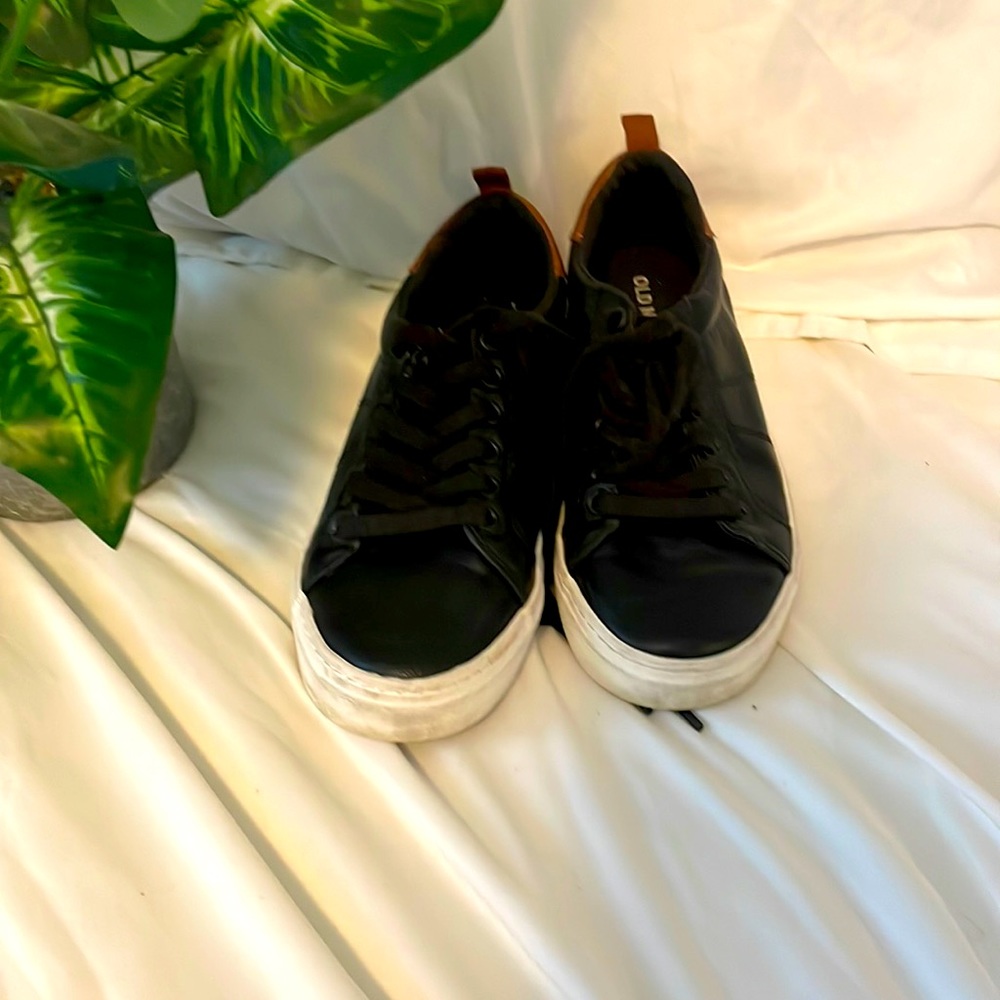 Old navy black sneakers size 1 year.